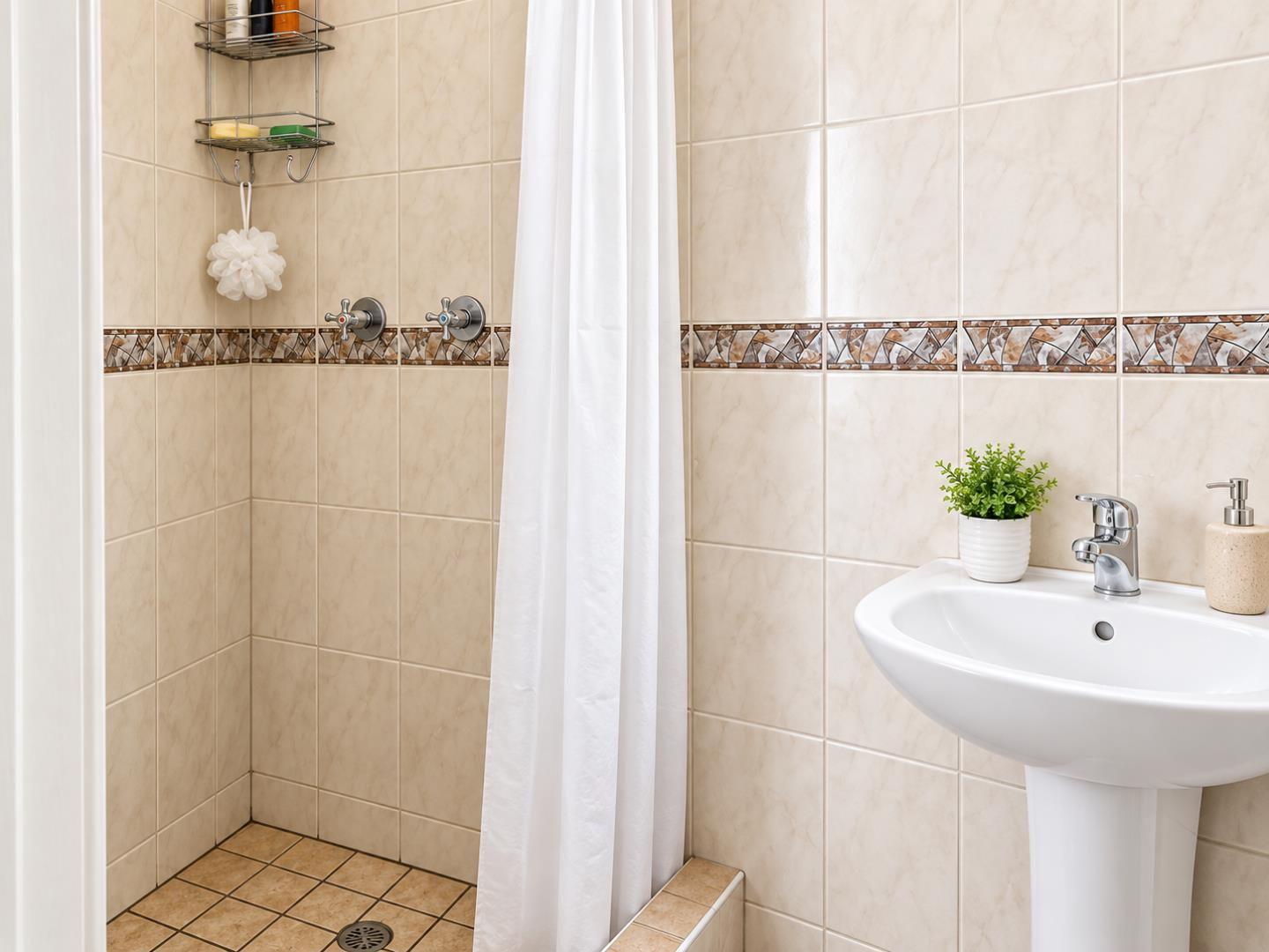 769695_Clean_Beige_Marble_Bathroom_Interior.png