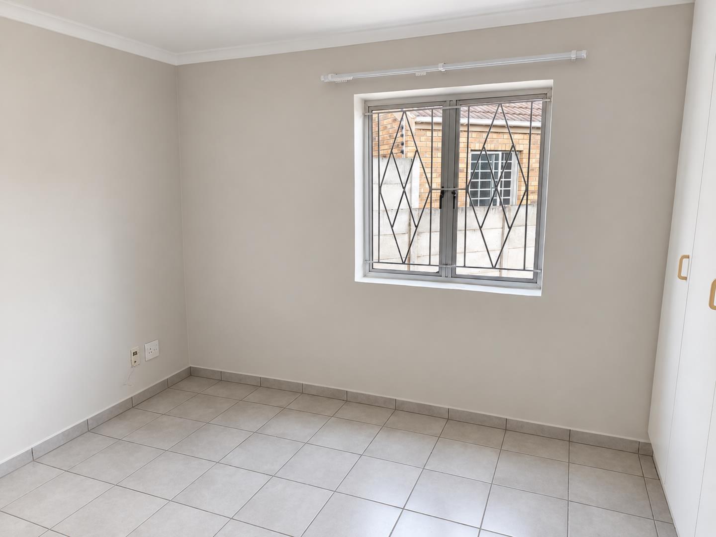 769788_Bright_Minimalist_Room_with_Window_and_Wardrobe.png