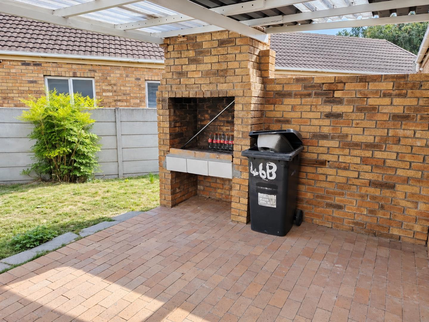 769788_Sunny_Backyard_Braai_Under_Pergola.png
