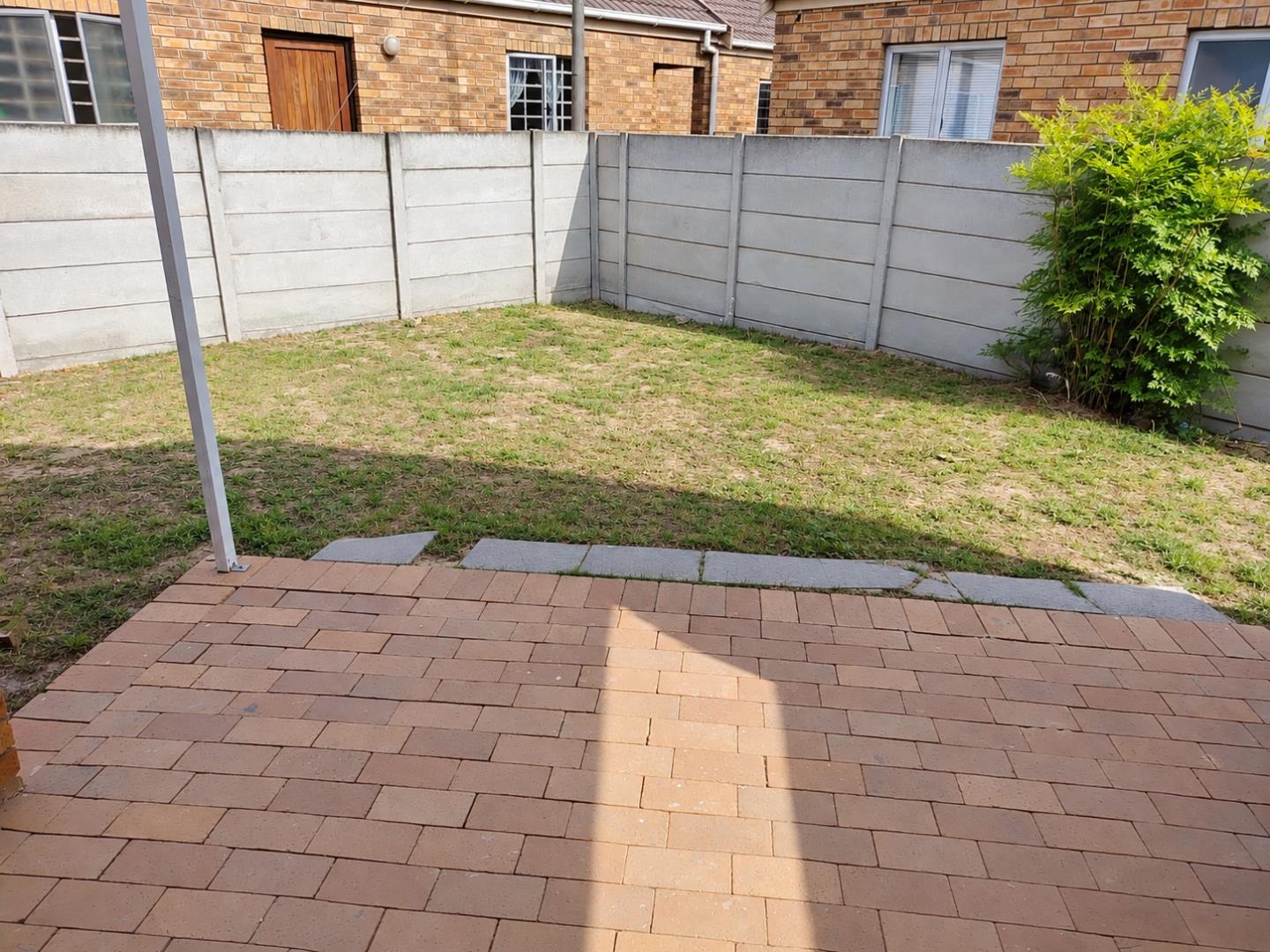 769788_Sunny_Suburban_Backyard_Patio.png