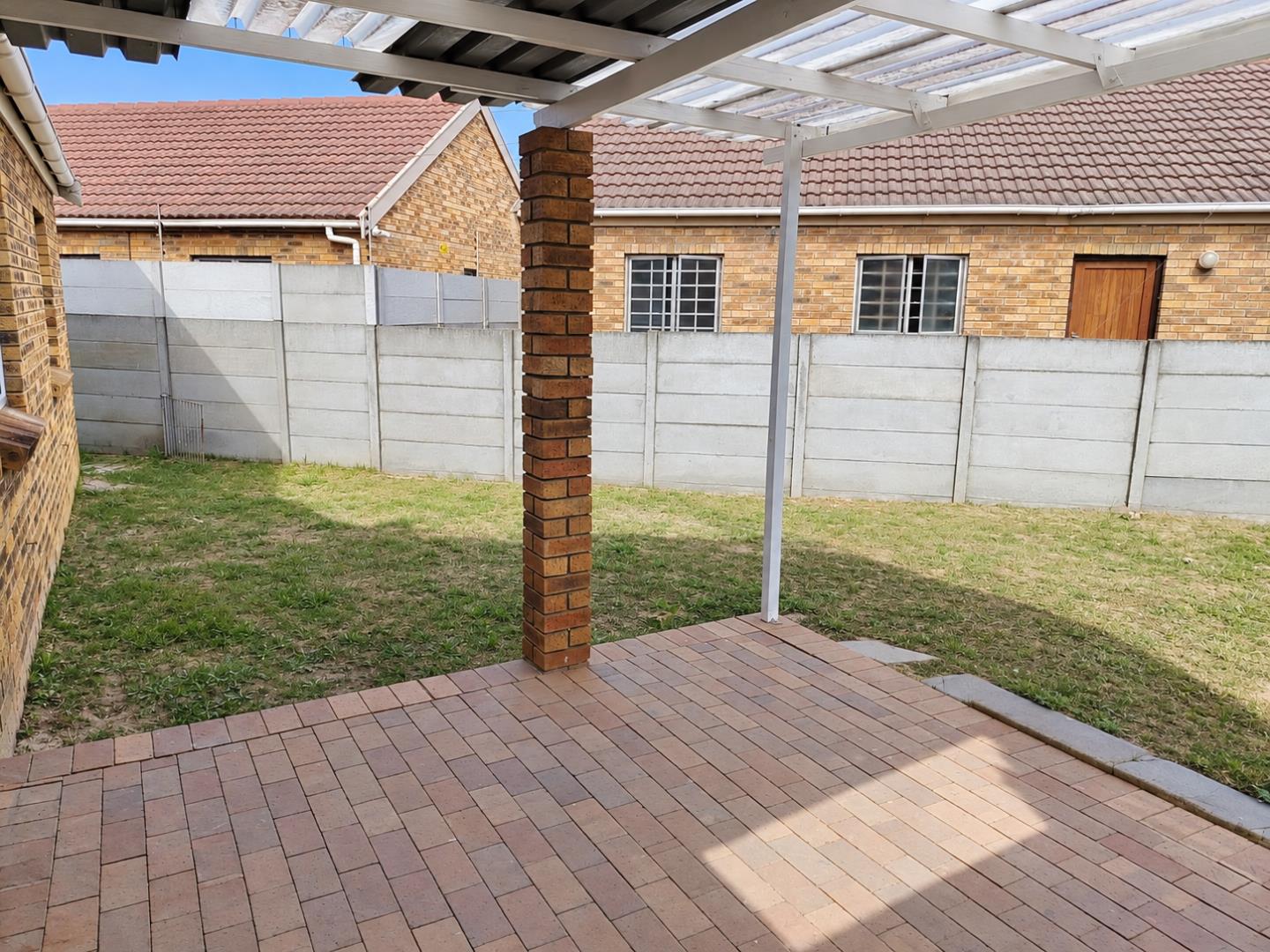 769788_Sunny_Suburban_Pergola_Patio.png