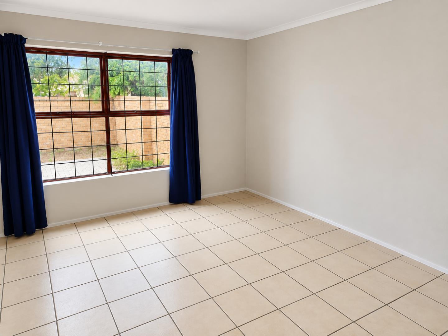769798_Bright_Empty_Room_with_Blue_Curtains.png