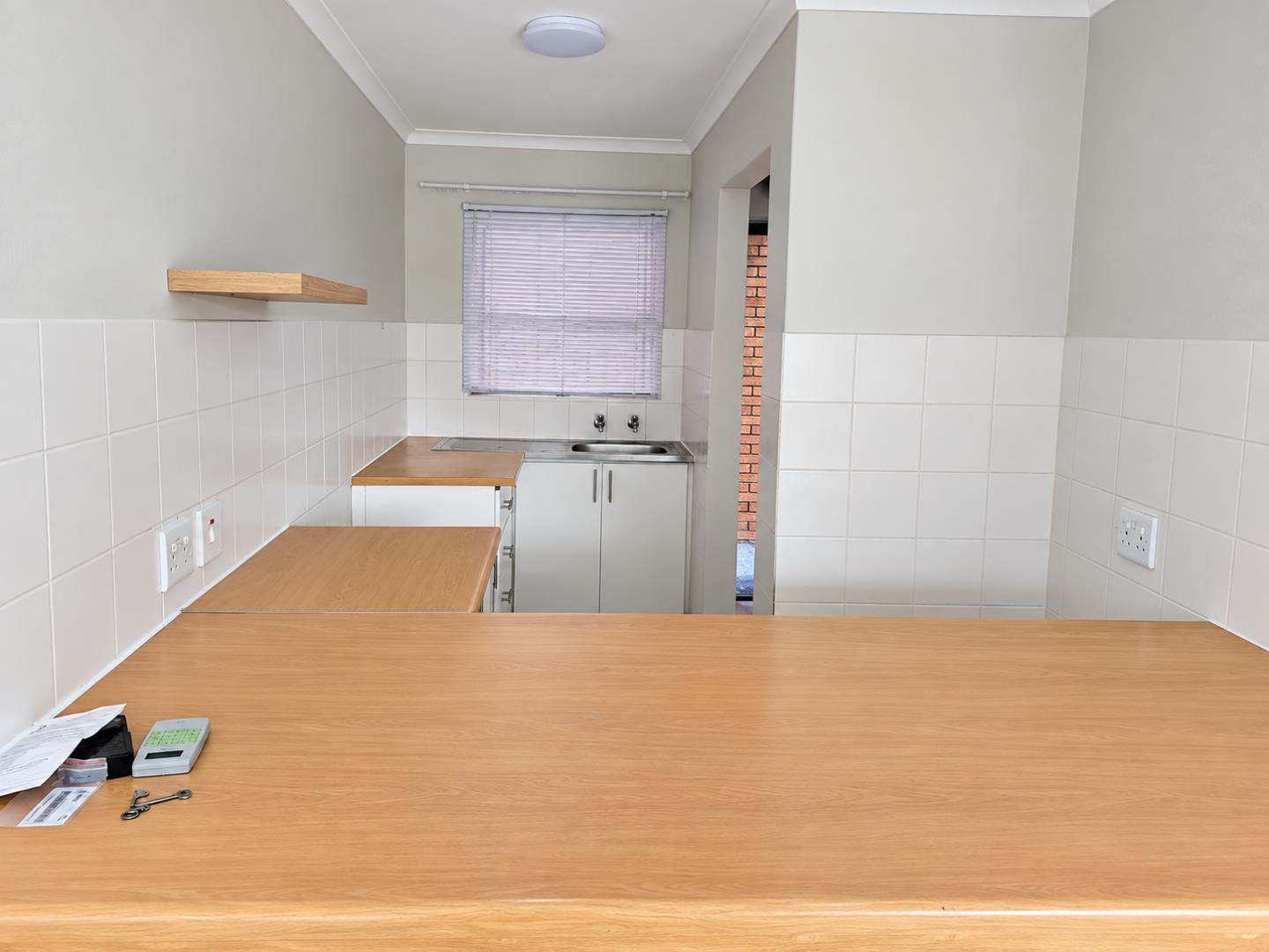 769798_Bright_Minimalist_Galley_Kitchen.png